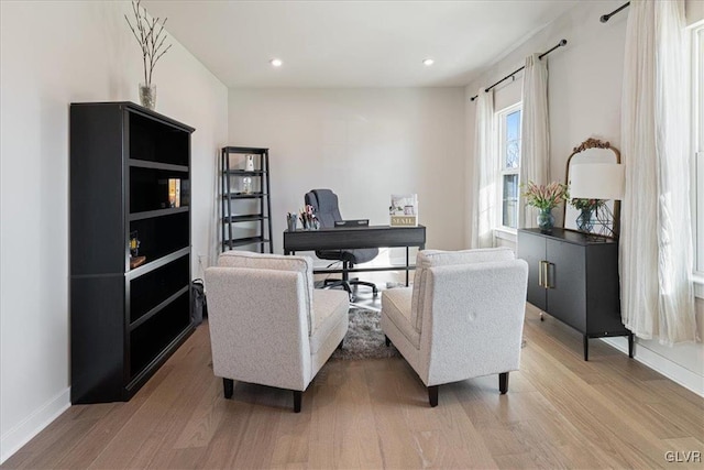 home office featuring light hardwood / wood-style floors