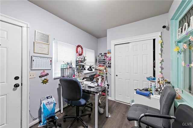 home office with dark wood-type flooring