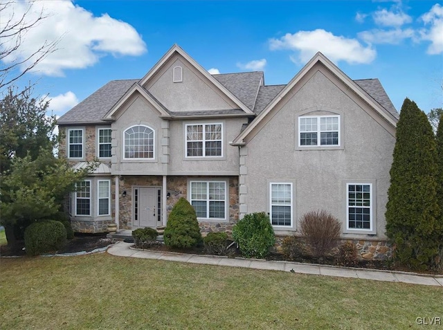 view of front of home featuring a front lawn