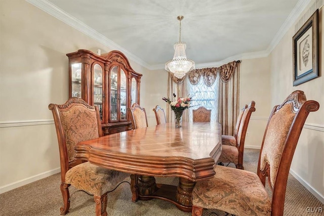 dining area featuring carpet floors, an inviting chandelier, and crown molding