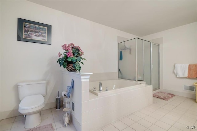 bathroom featuring tile patterned flooring, separate shower and tub, and toilet