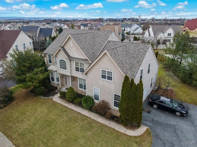 view of front of home featuring a front lawn