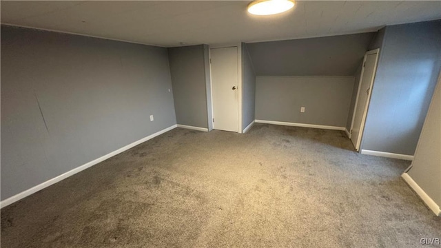 interior space featuring vaulted ceiling