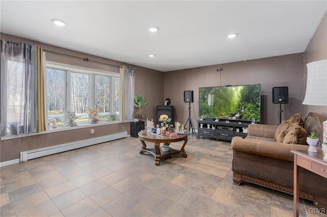 living room with a wood stove and a baseboard radiator