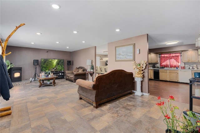 living room featuring a wood stove