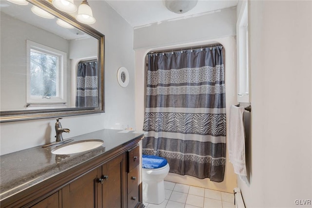 bathroom with tile patterned floors, vanity, toilet, and a shower with curtain