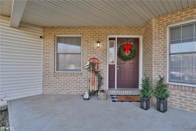 property entrance with covered porch