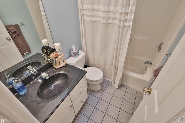 full bathroom with tile patterned flooring, vanity, shower / tub combo with curtain, and toilet