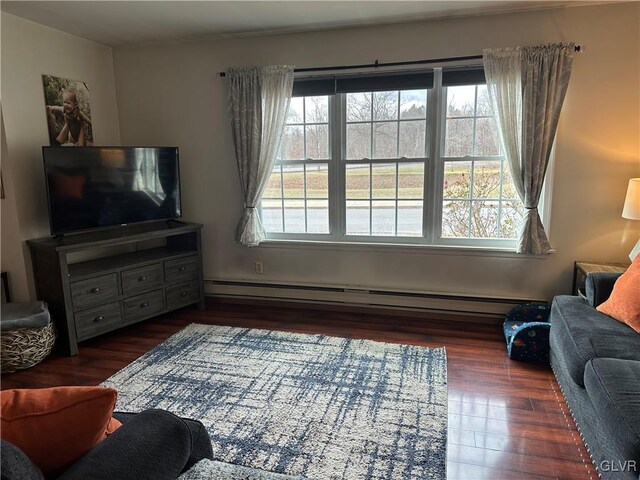 living room featuring baseboard heating