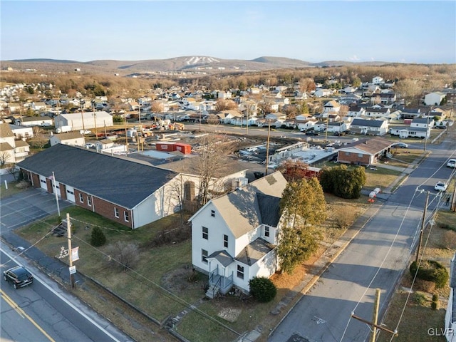 drone / aerial view featuring a mountain view