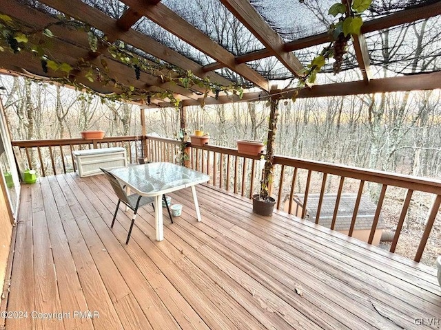 wooden terrace featuring a pergola