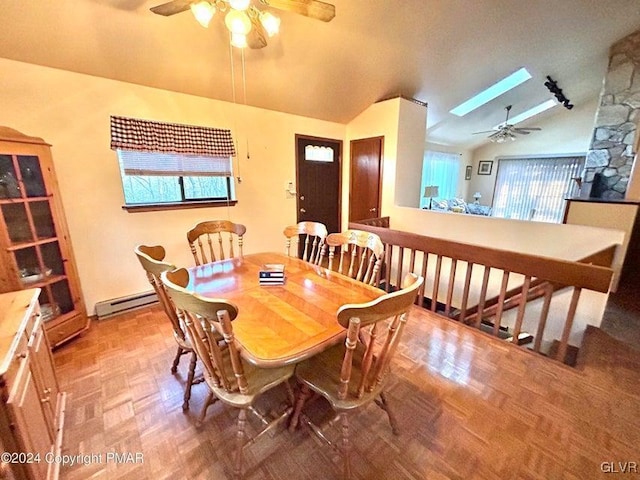 dining room with lofted ceiling with skylight, ceiling fan, a baseboard heating unit, and parquet flooring