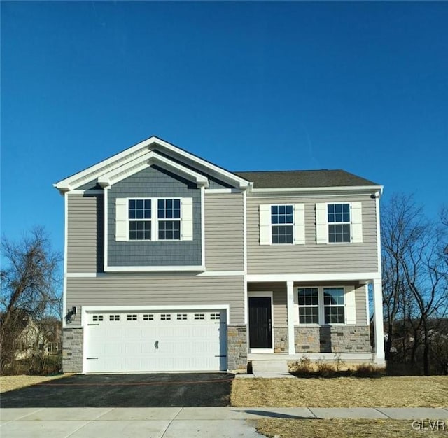 view of front of property featuring a garage