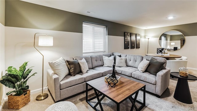 living room featuring light carpet