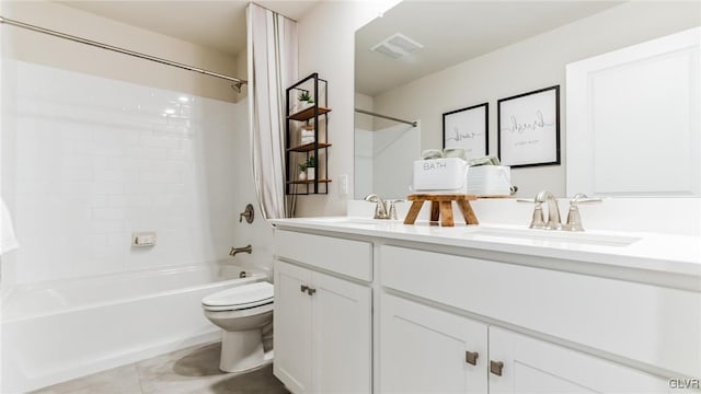 full bathroom with tile patterned floors, vanity, shower / bathtub combination, and toilet