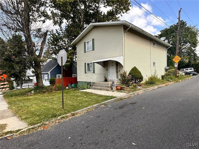 front of property with a front yard