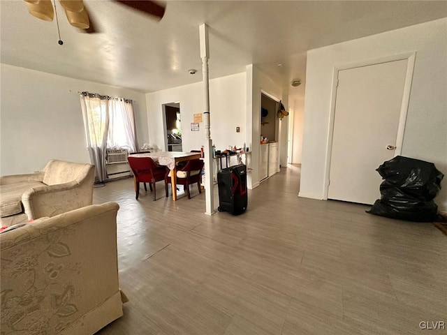 living room featuring ceiling fan