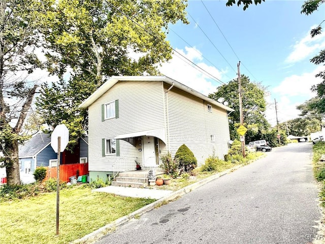 front of property with a front yard