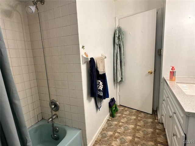 bathroom featuring vanity and shower / bath combo with shower curtain