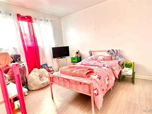 bedroom featuring hardwood / wood-style flooring