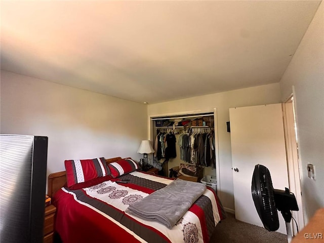 bedroom with carpet and a closet