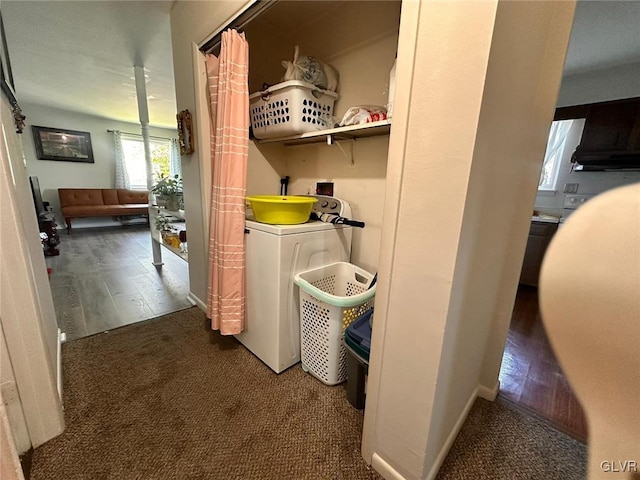 laundry room featuring washer hookup and dark colored carpet