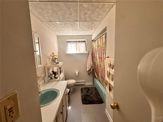 full bathroom featuring vanity, tile patterned flooring, toilet, baseboard heating, and shower / tub combo