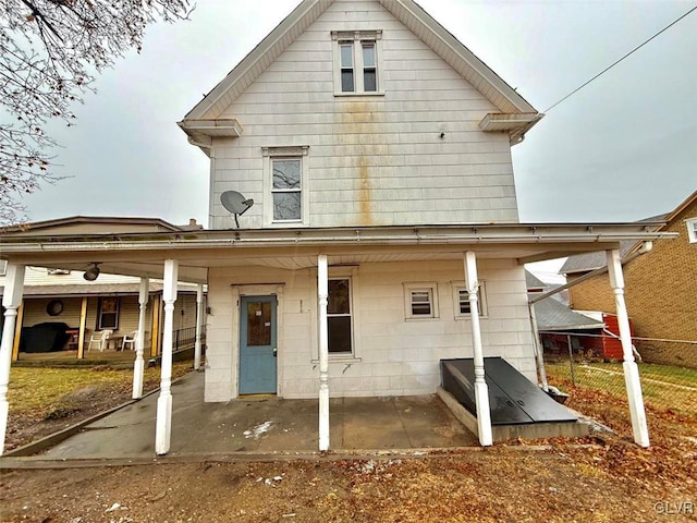 back of property featuring a patio