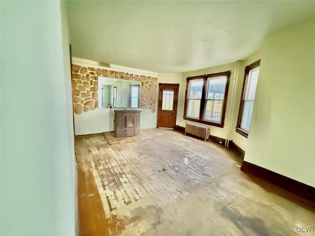 empty room featuring radiator heating unit