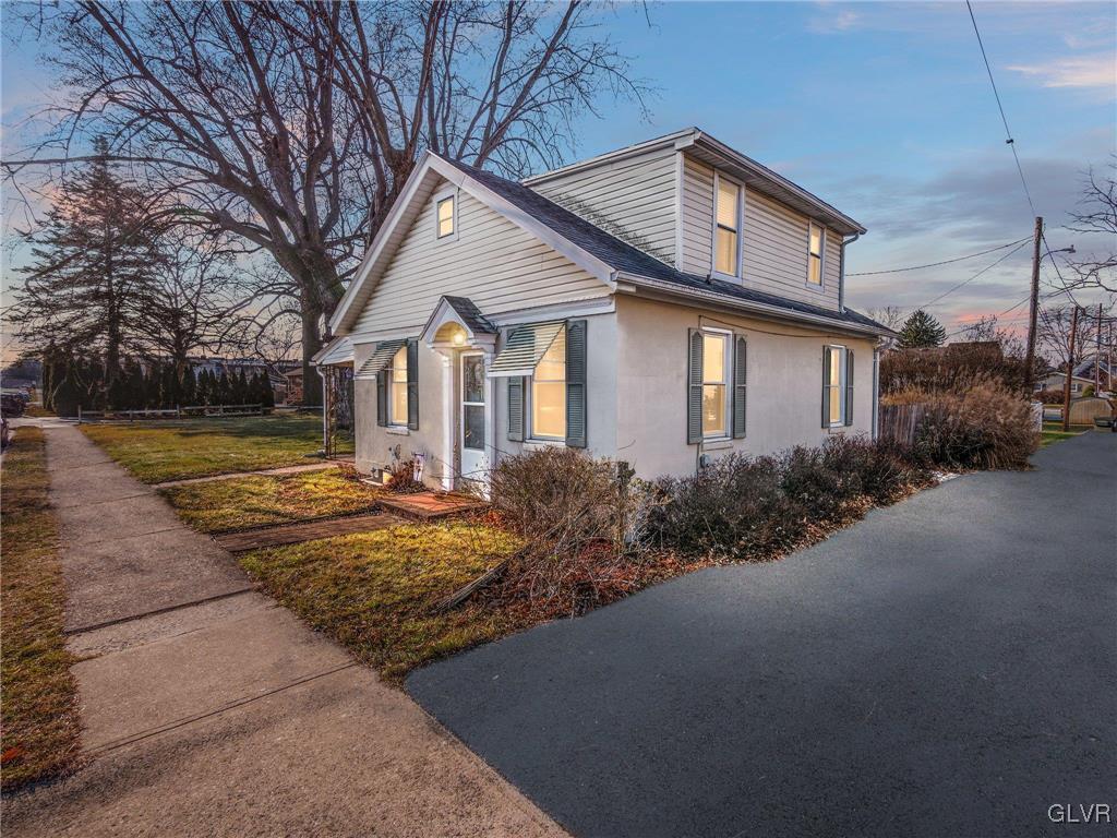 view of property exterior with stucco siding