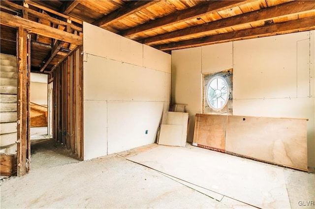 basement featuring wood ceiling