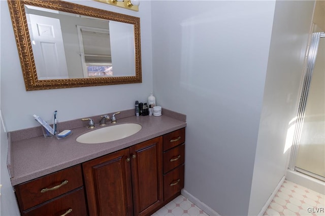 bathroom with vanity and walk in shower