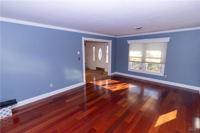 empty room with plenty of natural light, wood-type flooring, ornamental molding, and a baseboard radiator