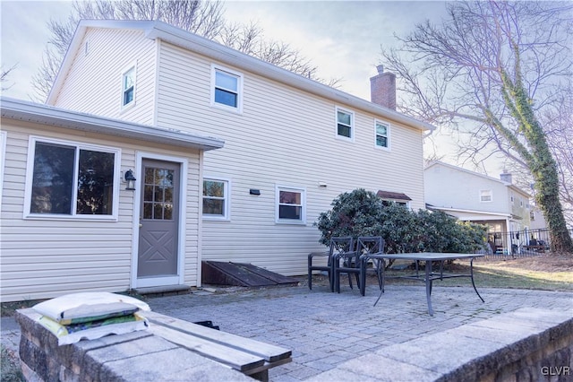 rear view of house featuring a patio area