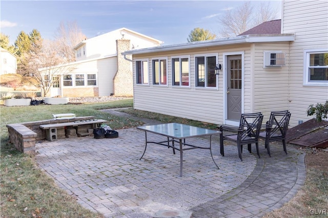 back of house featuring a patio