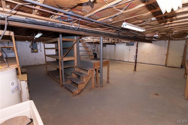 basement with electric panel and water heater