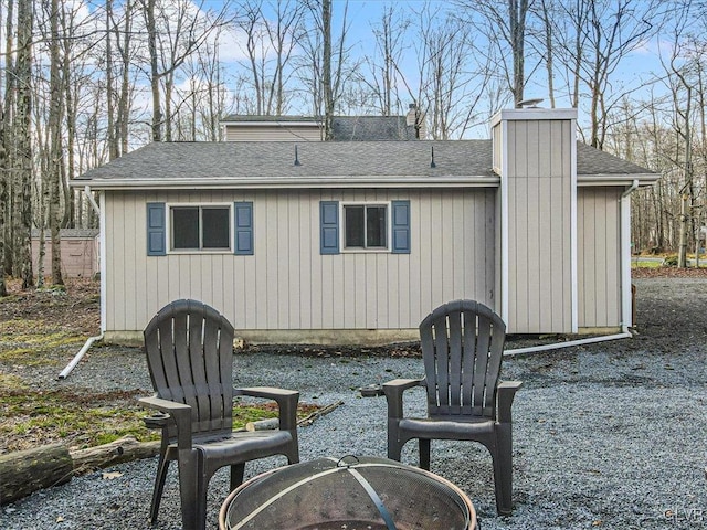 view of patio with an outdoor fire pit