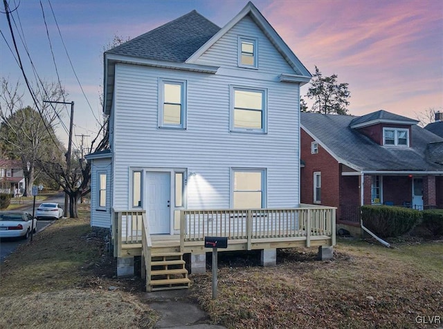 view of front facade featuring a deck