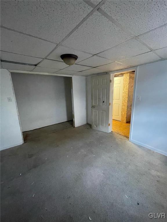 basement with a drop ceiling