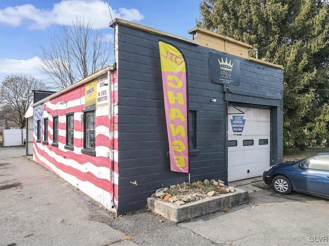 exterior space featuring a garage