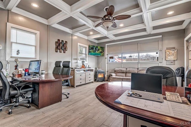 office with ceiling fan, coffered ceiling, beamed ceiling, crown molding, and light hardwood / wood-style floors