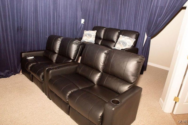 home theater featuring light colored carpet