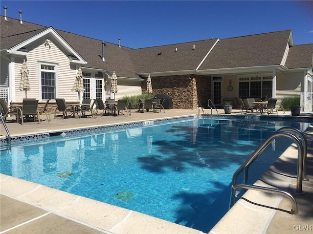 view of pool with a patio area