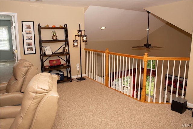 interior space featuring carpet and lofted ceiling