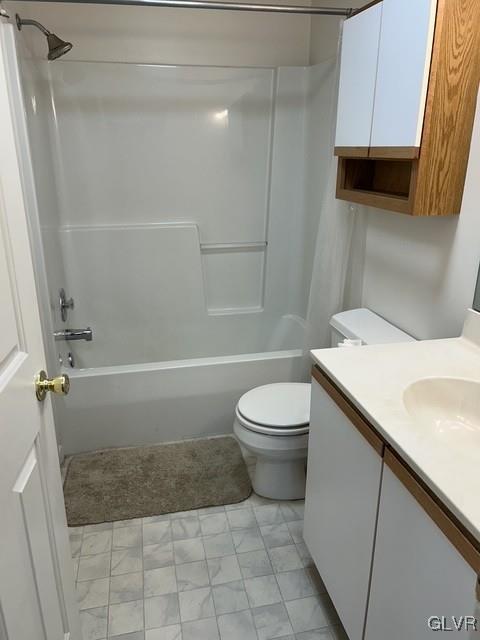 full bathroom with shower / bathing tub combination, vanity, and toilet