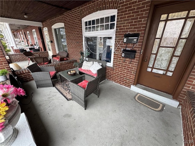 view of patio featuring covered porch