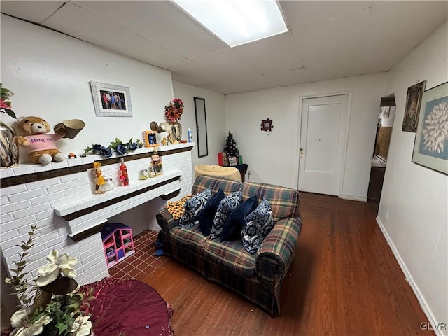 living room with dark hardwood / wood-style floors