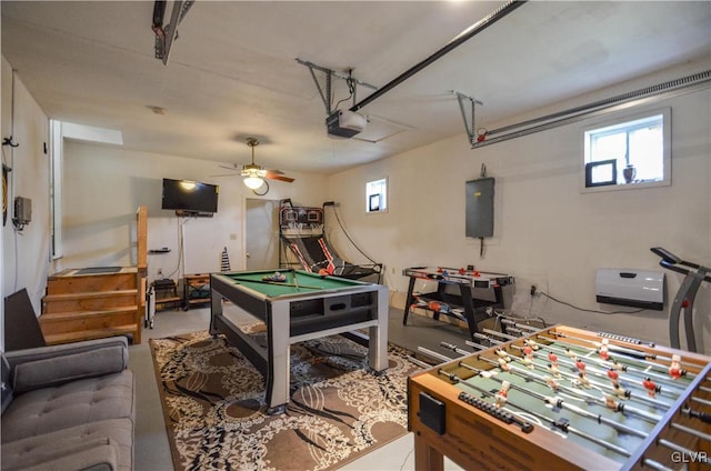 game room with concrete flooring, electric panel, ceiling fan, and pool table