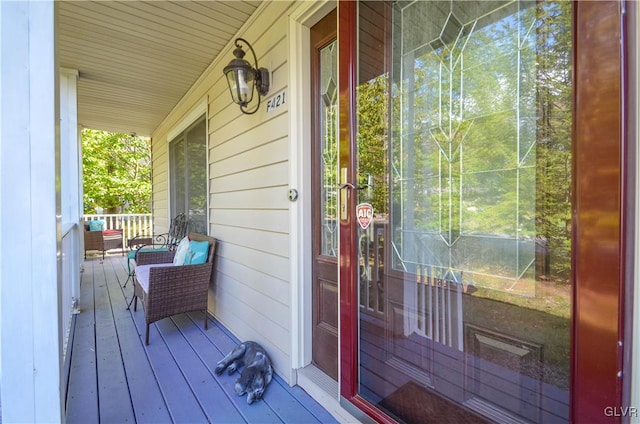 wooden deck featuring a porch