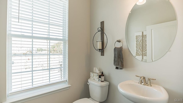 bathroom with sink and toilet